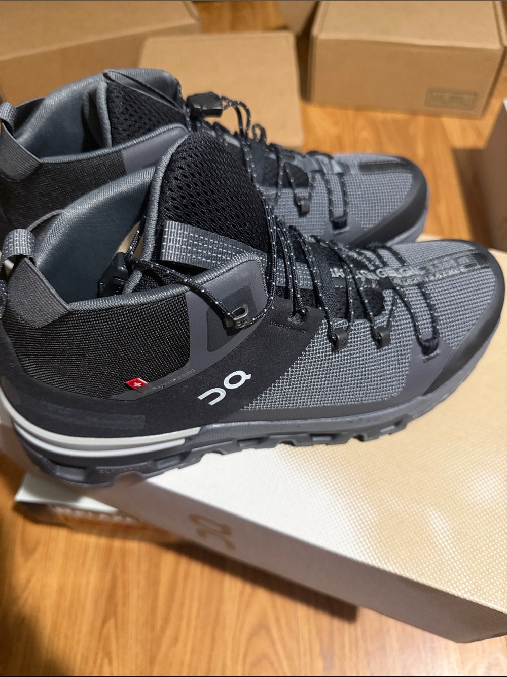 On Cloud Woman’s Cloudtrax  Mid-Top Hiking Shoes - Gray/Black